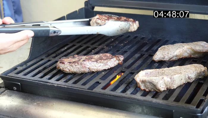 At 4 minutes 30 seconds, check for a beautiful sear on both sides. Flip the steaks.