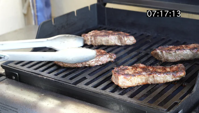 At 7 minutes, check again. A final rotation is optional for steaks about an inch and a half thick. Cook for another 1-2 minutes.