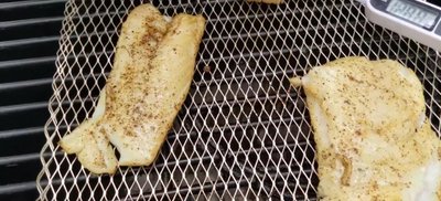 Check for doneness at 7-minute mark: At the 7-minute mark, check the cod's progress. Aim for 1:45 cook time.