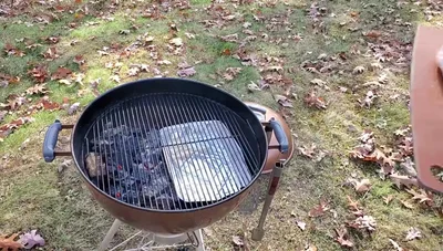 Position the turkey on the grill grate and close the lid.