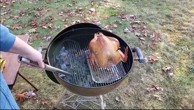 Continue grilling until the turkey timer pops and the meat thermometer indicates it's done.