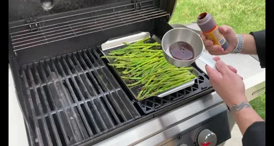 Baste the asparagus with fire honey.