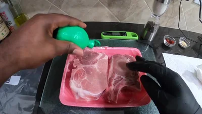 Rub smoked paprika all over the pork chops.