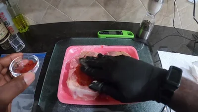 Rub smoked paprika all over the pork chops.