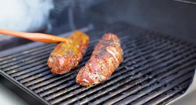 Brush the rested tenderloins with Blues Hog honey mustard.