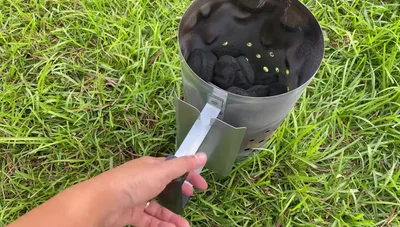 Place an aluminum pan with apple juice next to the charcoal to keep the ribs moist.