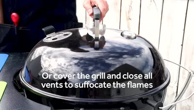 Cover the grill to close the vent and suffocate the flames.