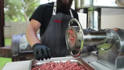 Form 6-ounce patties using a burger press and parchment paper. Let them sit in the fridge for a few hours to overnight to firm up.