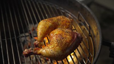 Stir up the charcoal and place the grill grate on.