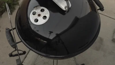 Set bottom vents half open and top vents half to full open. Target temperature: 325-375°F.