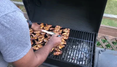 Check the internal temperature of the chicken wings (should be around 165°F).