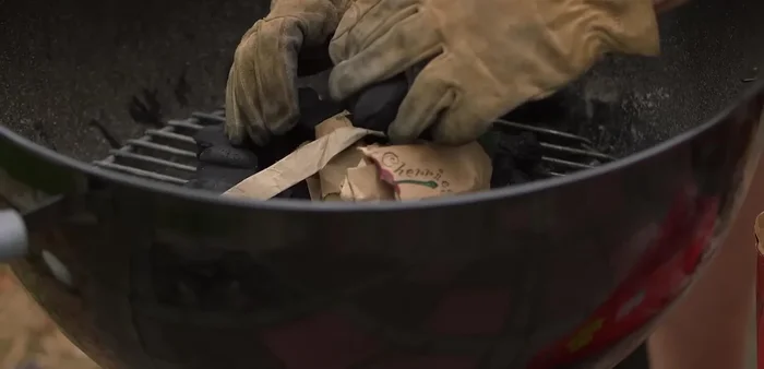 Arrange charcoal briquettes: Create a pyramid shape, leaving some space for air circulation. Don't smother the fire.