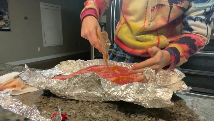 Apply rub: Generously rub the brisket with your chosen spice blend.