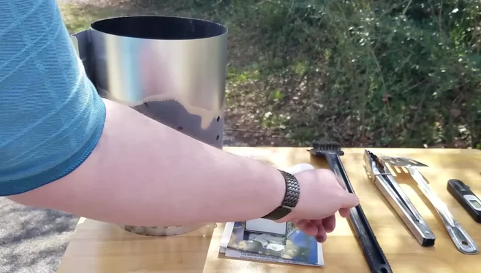 Prepare the grill: Clean the grate with a grill brush.