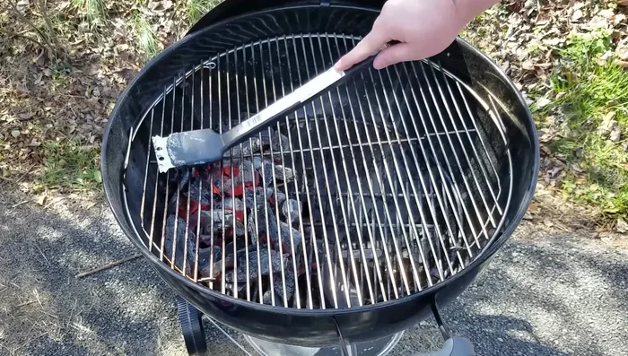 Place food on the grill (directly over coals for searing, indirectly for slower cooking).