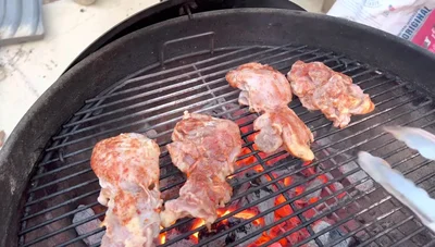 Sear both sides of the chicken thighs until slightly charred.