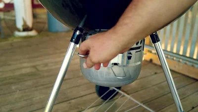 Spread the charcoal slightly, concentrating the heat.