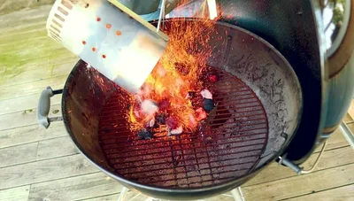 Spread the charcoal slightly, concentrating the heat.