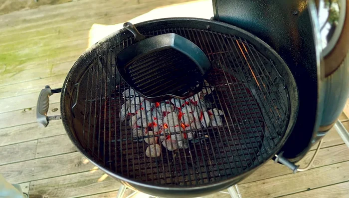 Place a cast iron skillet (optional) or vortex (optional) on top of the heat.