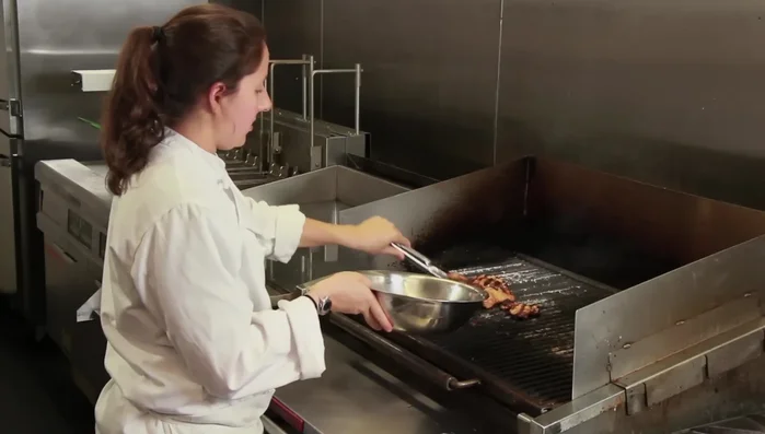 Remove chicken thighs from grill once cooked through (approximately 7-10 minutes for boneless, skinless thighs).