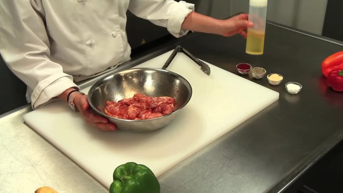 Marinate skinless and boneless chicken thighs with olive oil, salt, garlic powder, pepper, and paprika.