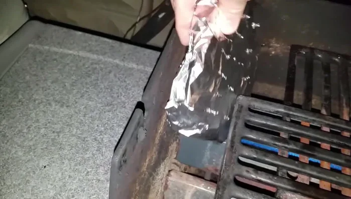 Set up the grill for indirect heat: Place the wood chip packets on the grill's back burners. Position the brisket on the grill grate, away from the direct heat, allowing fat to drip down. Maintain a temperature around 250°F.