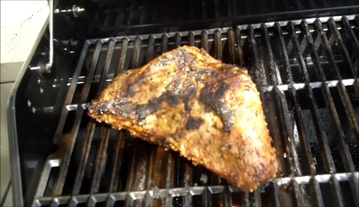 Remove the tri-tip from the grill and let it rest for at least 5-10 minutes before slicing.