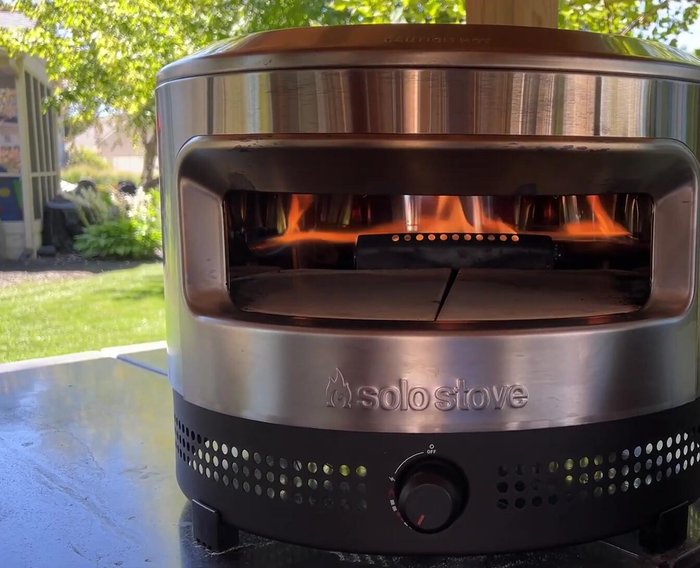 Preheat the pizza oven to 700 degrees Fahrenheit.