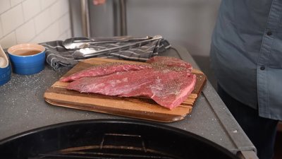 Set up your grill for indirect heat: hot coals on one side, no coals on the other.