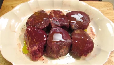 Generously season both sides of the steaks with kosher salt and freshly ground black pepper.