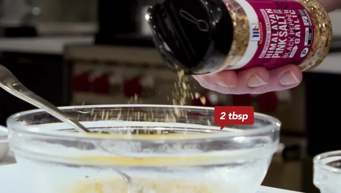 Prepare the Lemony Garlic Butter: Melt unsalted butter. Add 2 tablespoons of all-purpose seasoning, 2 teaspoons of lemon juice, and mix well. Reserve some for dipping later.