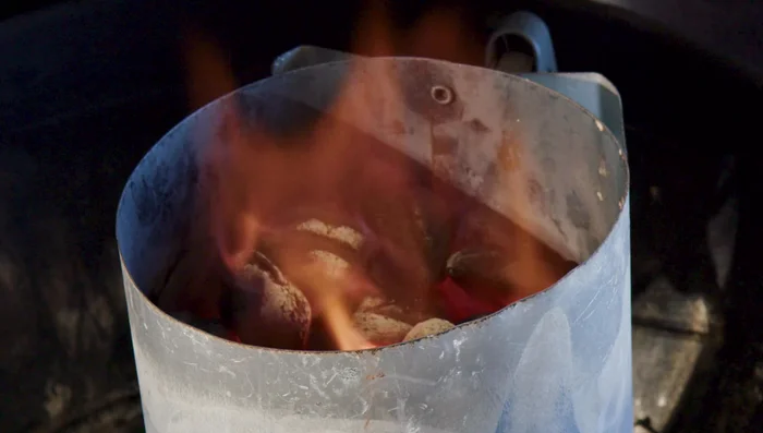 Check for ash and flames on top - indicates readiness.