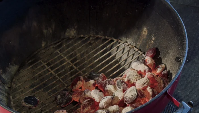 Create two zones: one with banked coals (direct heat), one without (indirect heat).