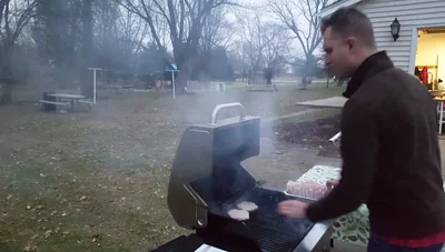 Lightly season patties while they grill.