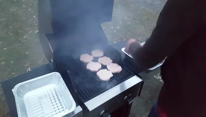 While patties cook, prepare a separate pan for the buns to avoid cross-contamination.