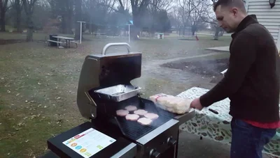 Lightly season patties while they grill.
