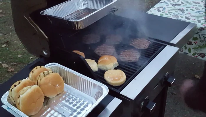Toast the buns on the grill for a final touch. Close the grill lid to maintain heat.