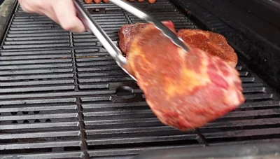 Continue cooking on indirect heat until the steaks reach 115-120°F (46-49°C).