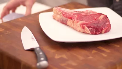 Optional: Dunk the seasoned steak in clarified butter before grilling for enhanced flavor and browning.