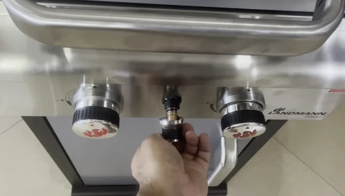 Install the double A battery for the igniter (or use an external barbecue lighter).