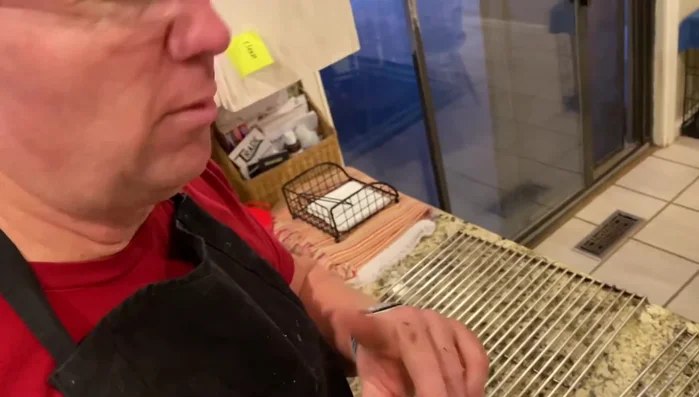 Reinstall the cleaned grates back onto the grill.