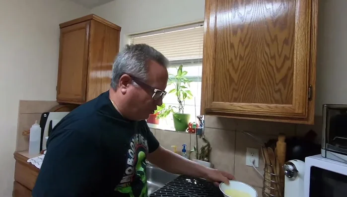 Apply a light coating of oil (vegetable or flaxseed) to all surfaces of the grates using paper towels or a brush.