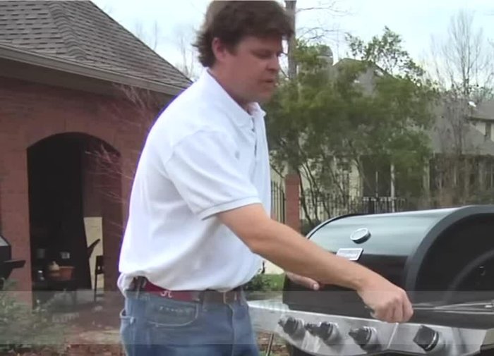 Place catfish fillets in the grill basket. The basket prevents delicate fish from falling through the grill grates and sticking.