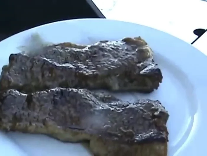 Once cooked, remove the steaks using tongs and place them on a clean plate.