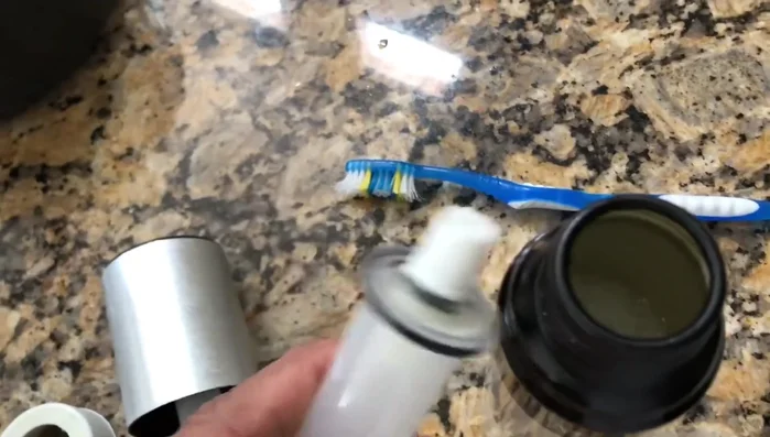 Fill the sprayer halfway with hot water, add a little dish soap, and pump to flush out any remaining residue.