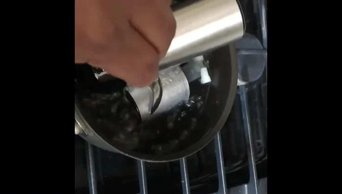 Rinse the parts thoroughly with hot water.