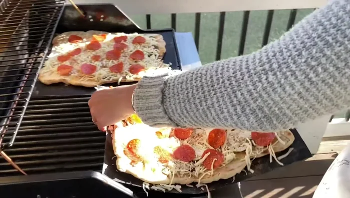 Place the non-stick grill mat on the grill.