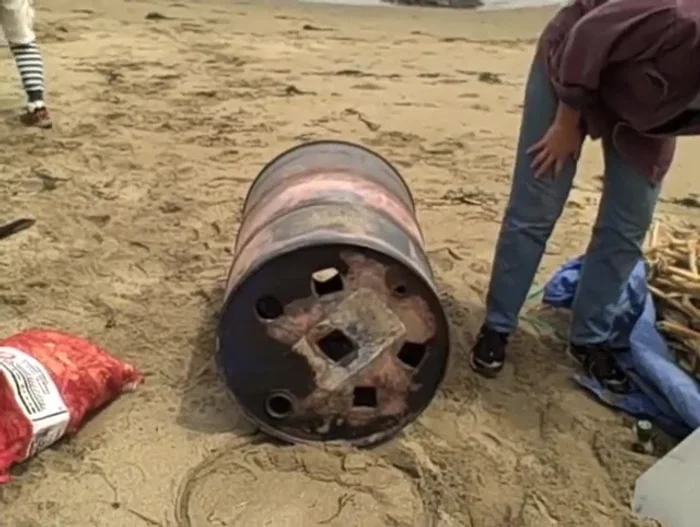 Place a large stick in the middle of the drum to create a chimney effect for better airflow.