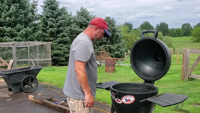 Heat the grates on a grill to about 250°F until completely dry.