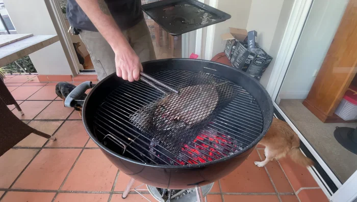 Grill the mackerel, oiling it occasionally to maintain moisture and achieve crispy skin. Flip it once the underside is cooked (less than a minute).